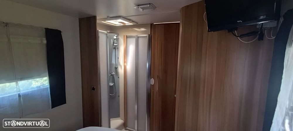 Challenger Genesis 69 cama central e basculante
