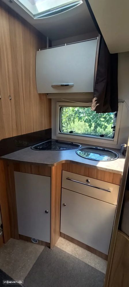 Challenger Genesis 69 cama central e basculante