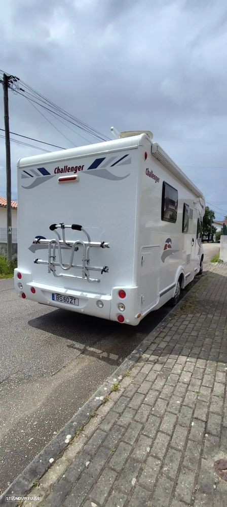 Challenger Genesis 69 cama central e basculante
