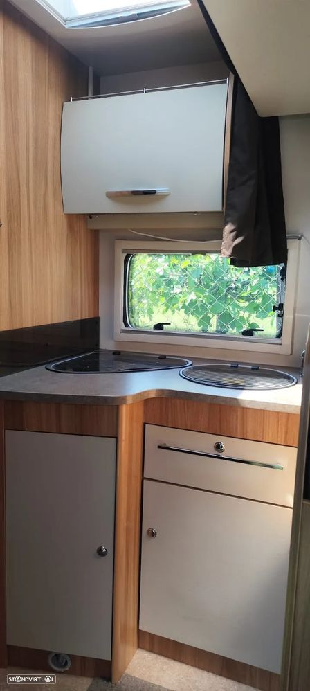 Challenger Genesis 69 cama central e basculante