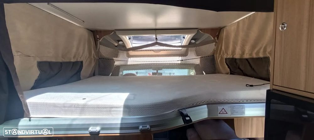 Challenger Genesis 69 cama central e basculante
