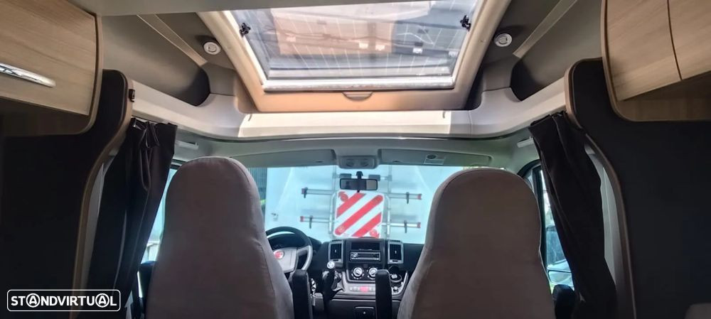 Challenger Genesis 69 cama central e basculante