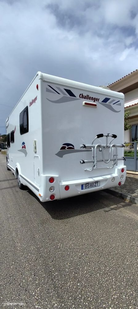 Challenger Genesis 69 cama central e basculante